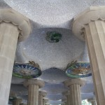 Doric columns supporting the roof of the lower court.
