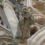 A close-up of a gargoyle on the Basilica of St. Nazaire in Carcassonne
